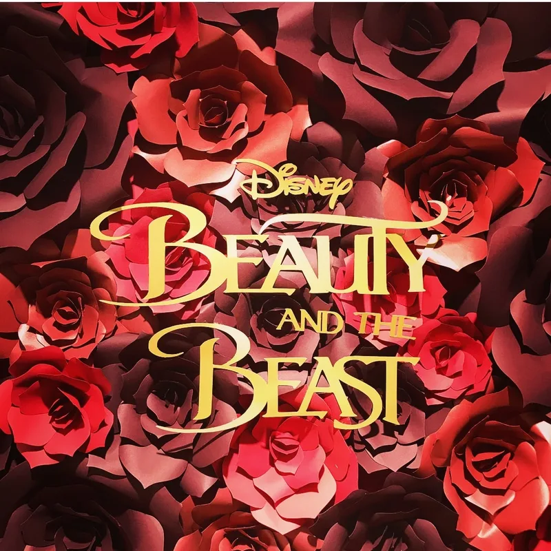 beauty and the beast paper flower wall set up papermeister