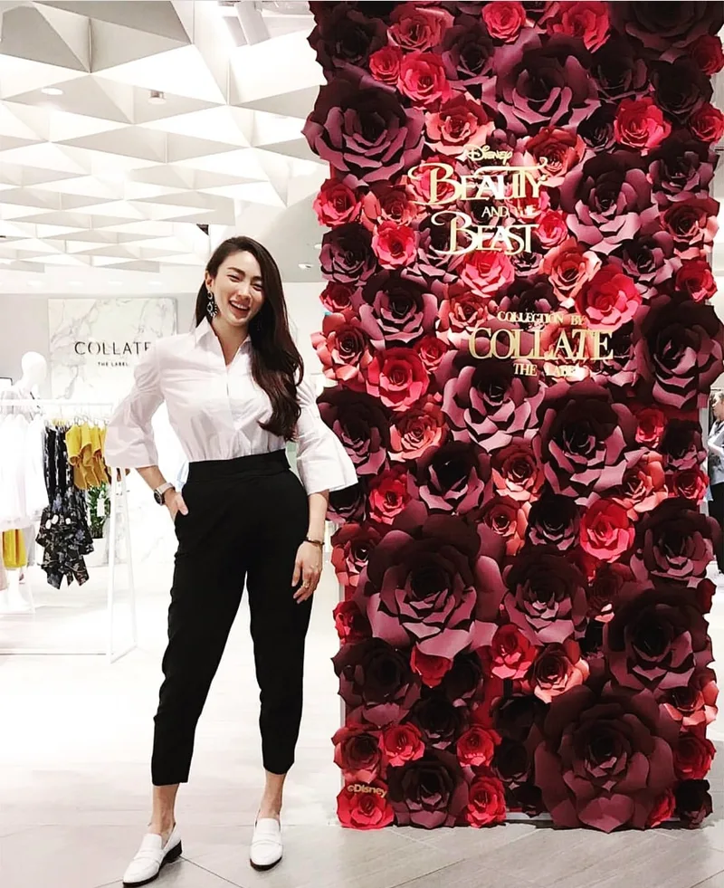 beauty and the beast paper flower wall set up papermeister