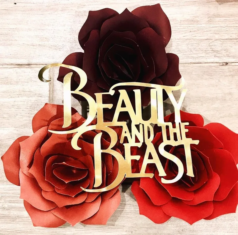 beauty and the beast paper flower wall set up papermeister